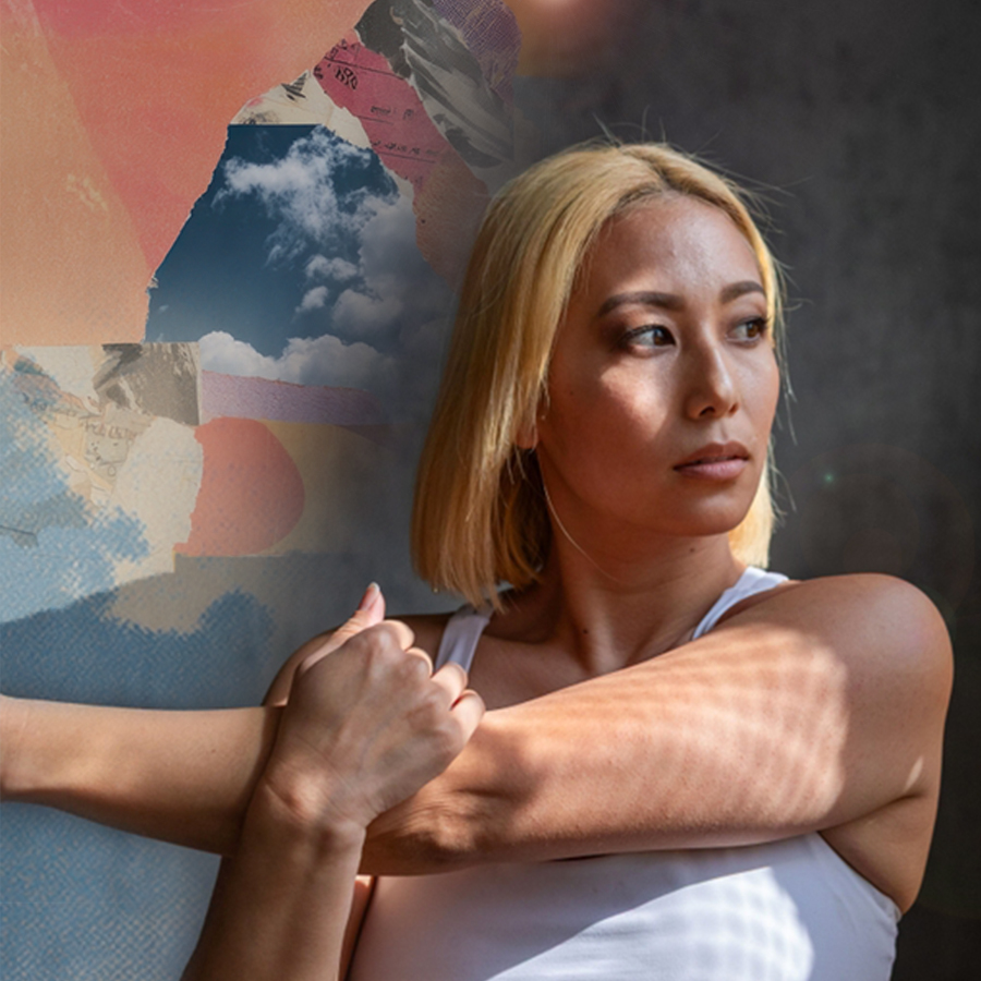 Sportlerin in fokussierter Pose – mentale Stärke